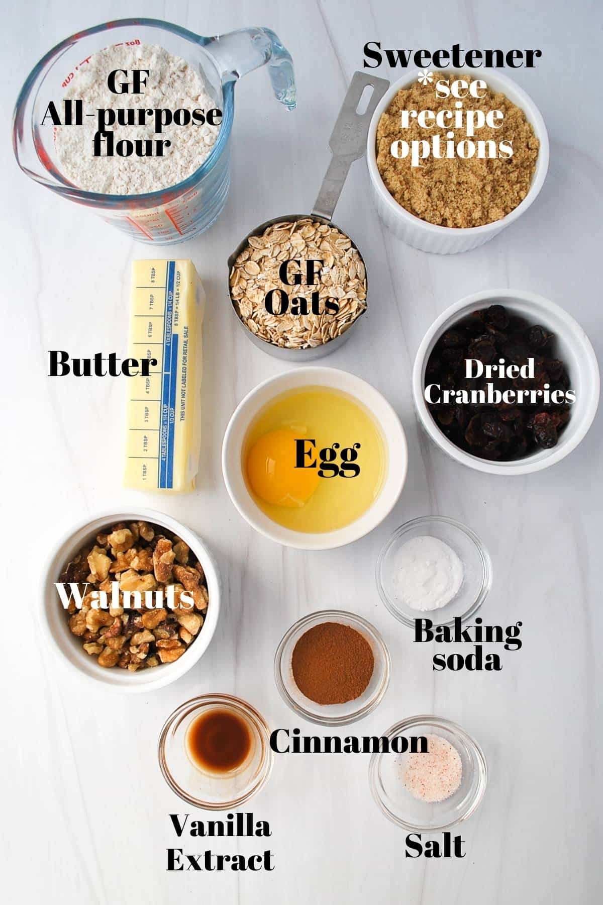 ingredients for oatmeal cranberry cookies measured out on a counter