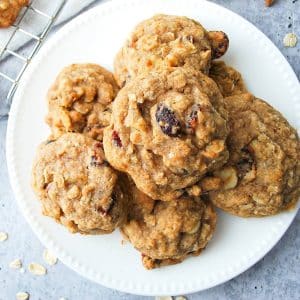 plate of stacked gluten free oatmeal cranberry cookies