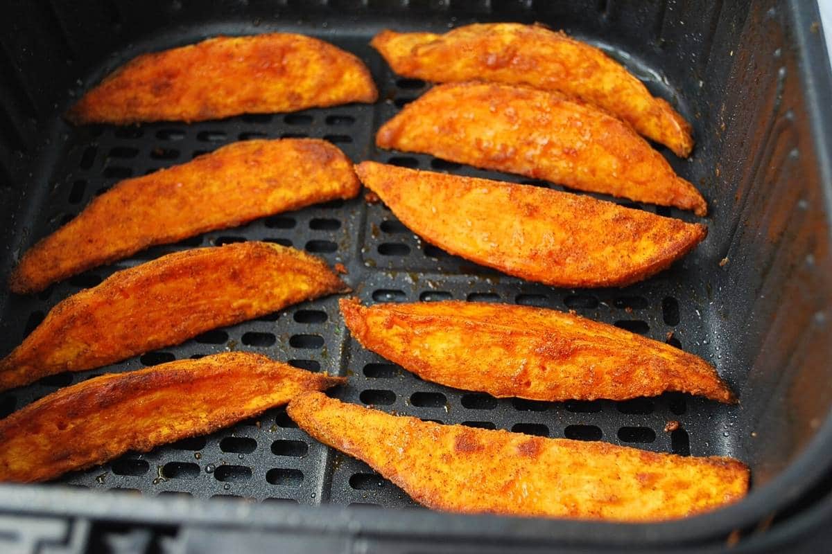 sweet potato wedges in an air fryer cooked