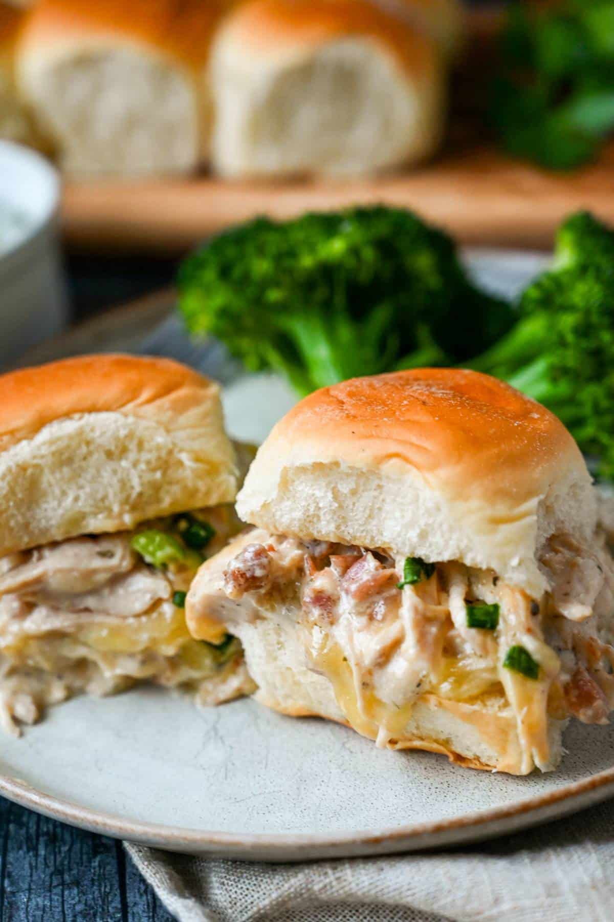 crack chicken sliders on a plate with broccoli 