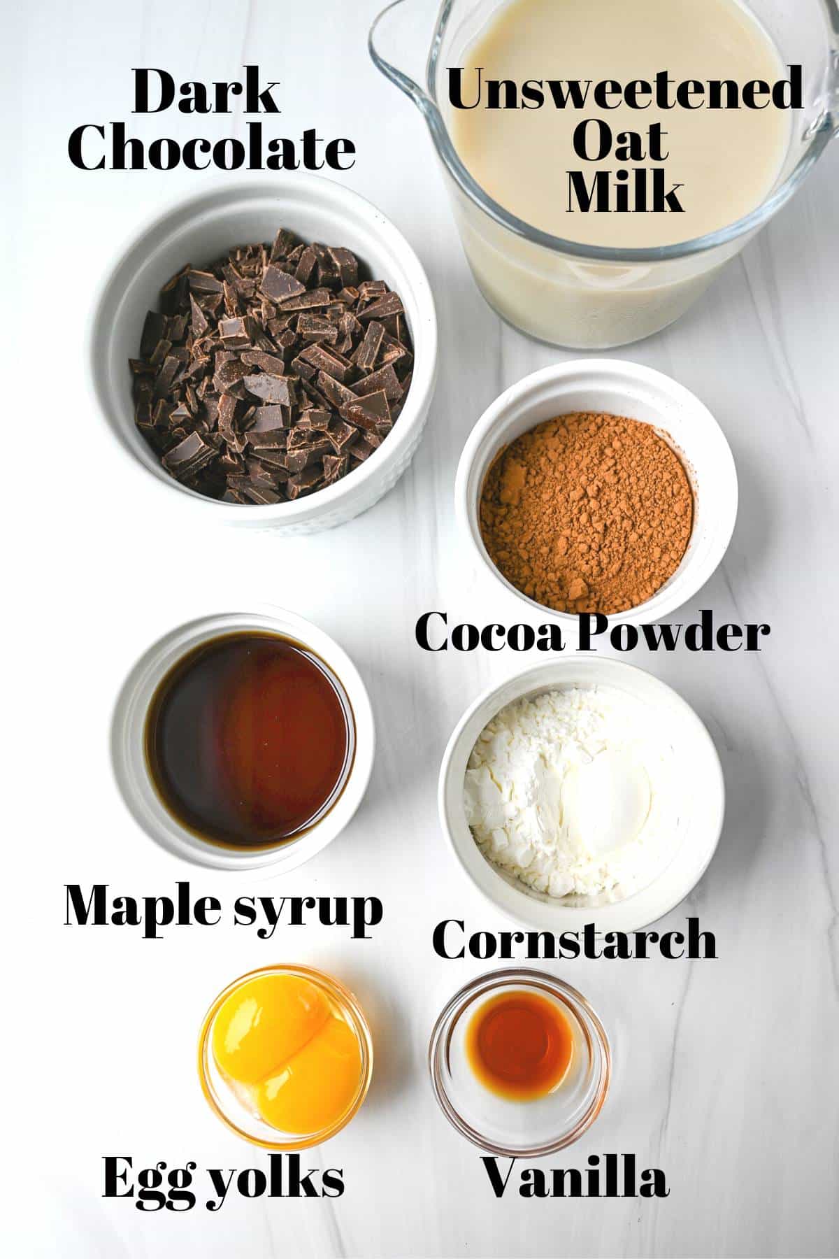 ingredients for oat milk chocolate pudding measured out on a counter