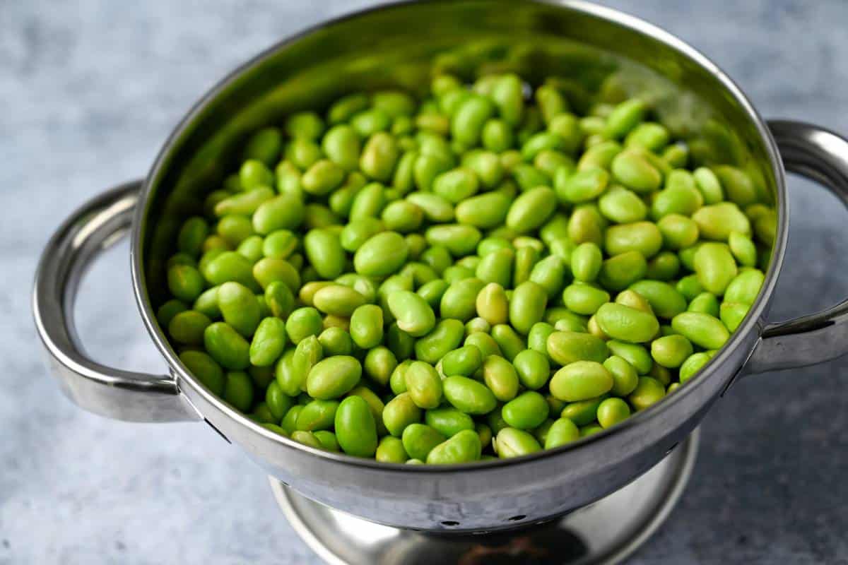 cooked mukimame in a colander