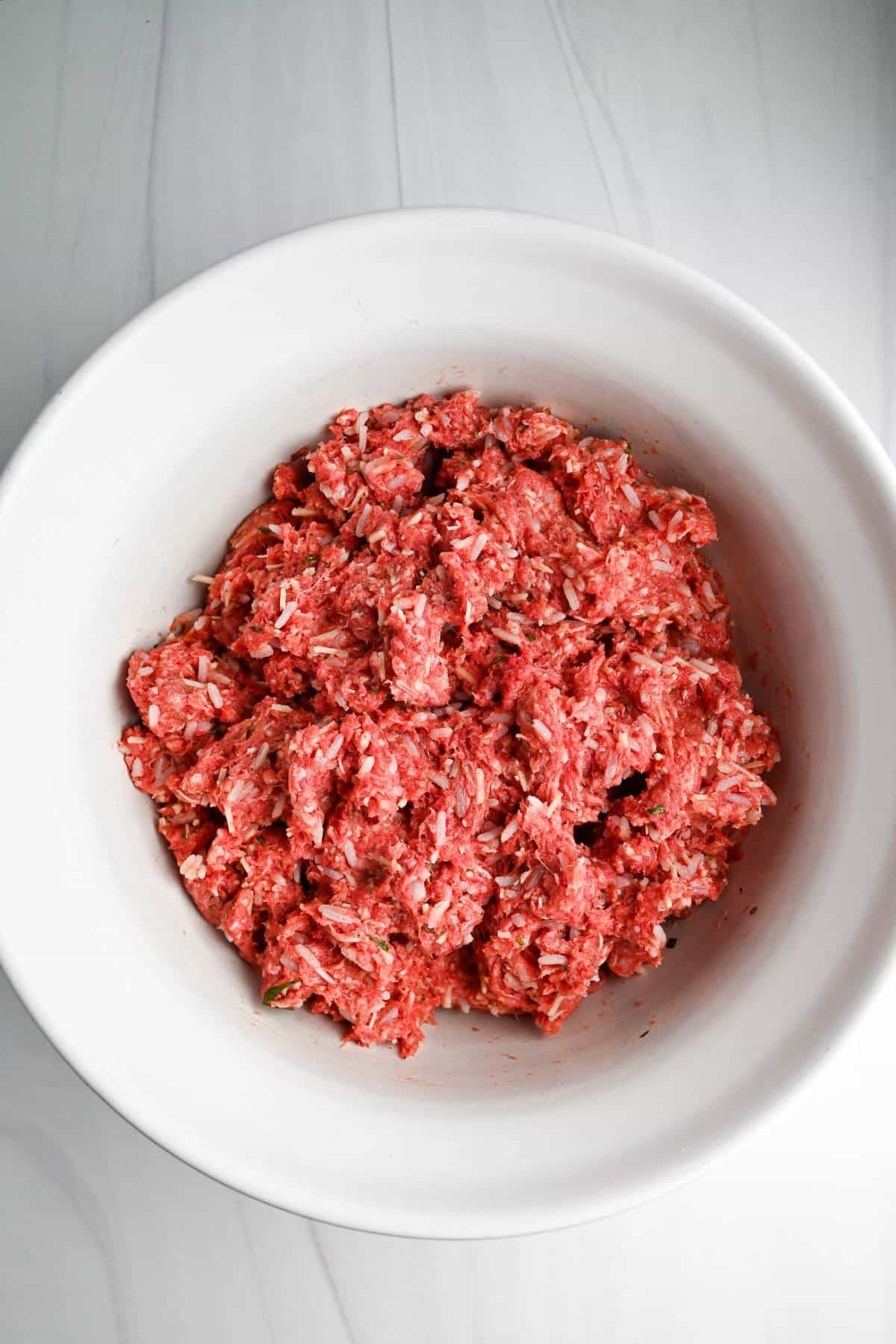 gluten free meatloaf mixture made with rice in a bowl