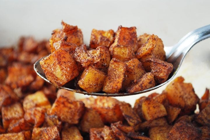 serving spoonful of roasted butternut squash