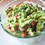Guacamole in a clear glass bowl