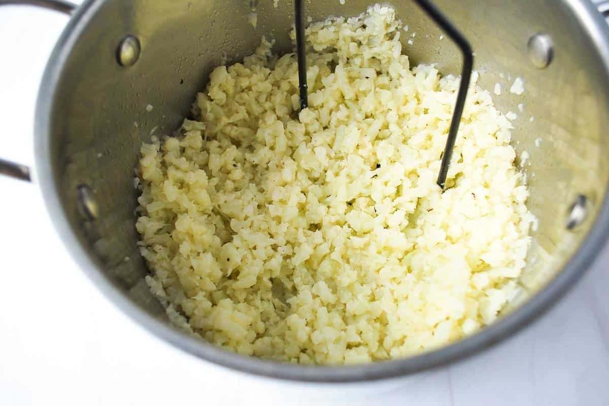 mashed cauliflower florets in a pot