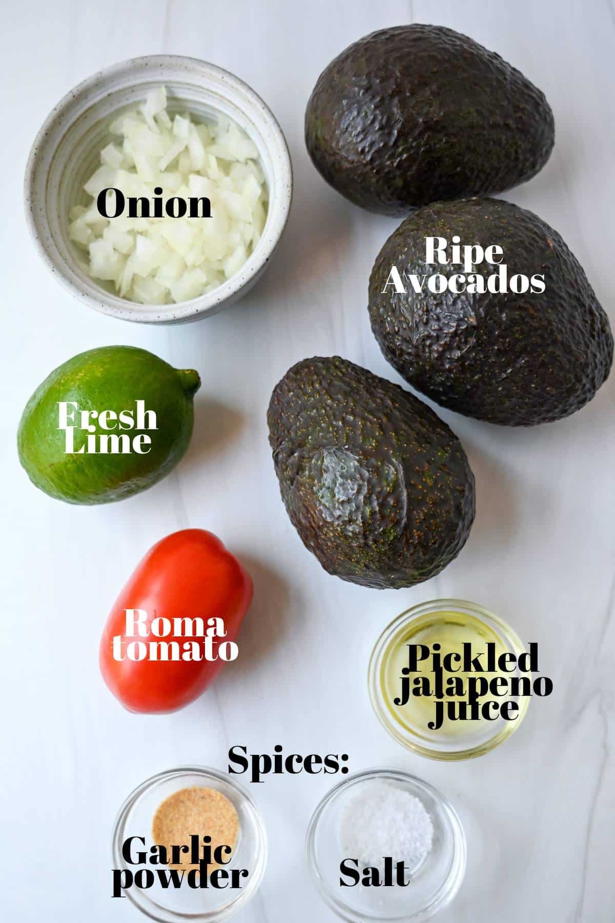 ingredients for easy 5 ingredient guacamole measured out on a counter