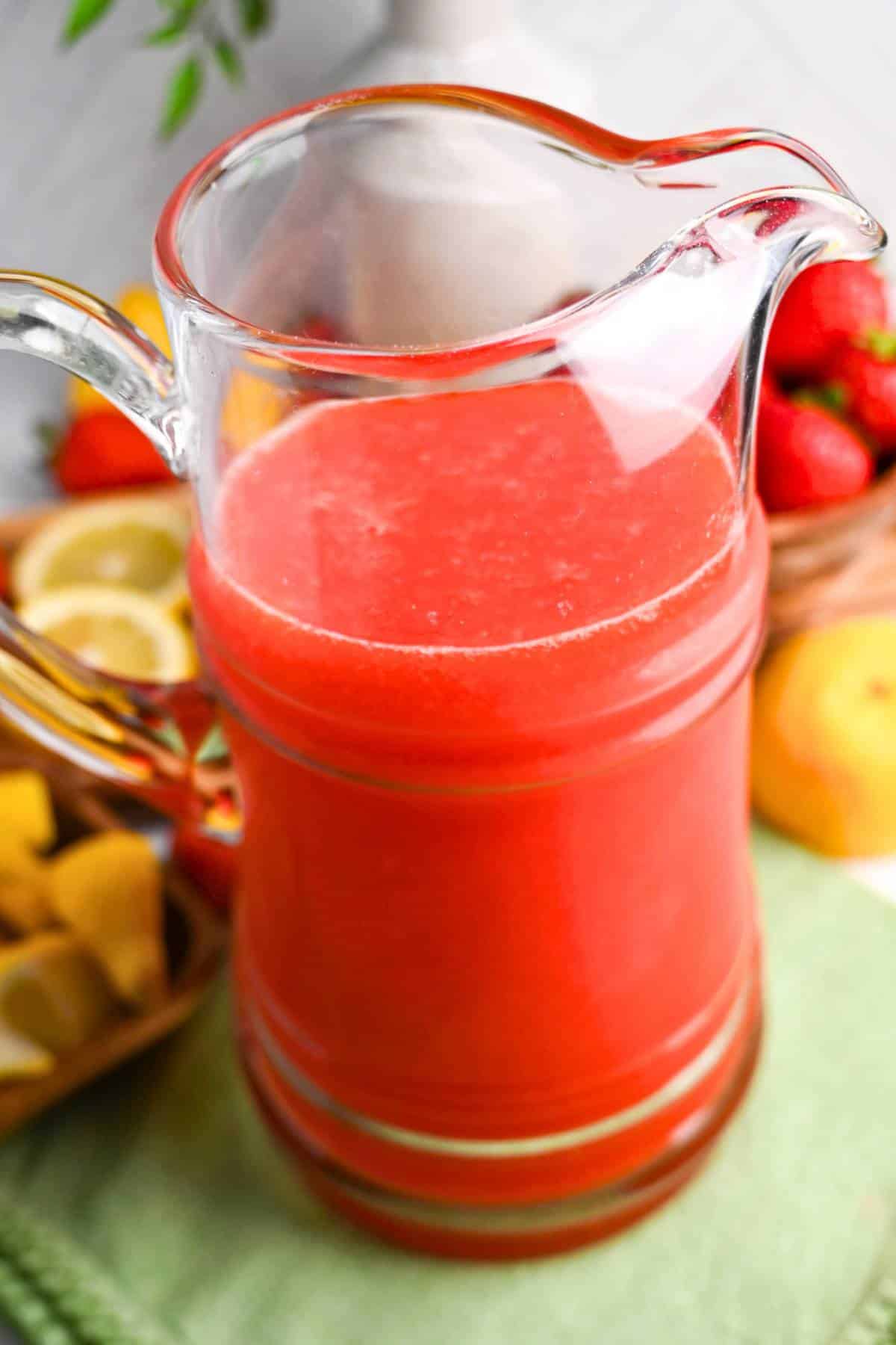 a pitcher of homemade strawberry lemonade made with splenda