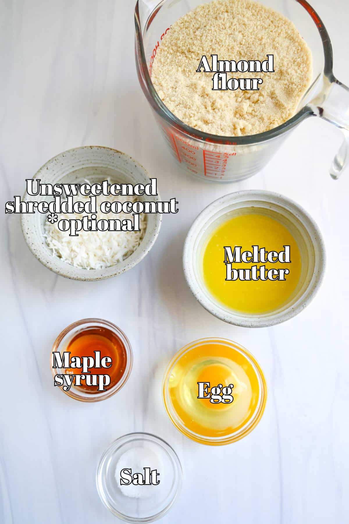 labeled ingredients measured on a counter for almond flour pie crust