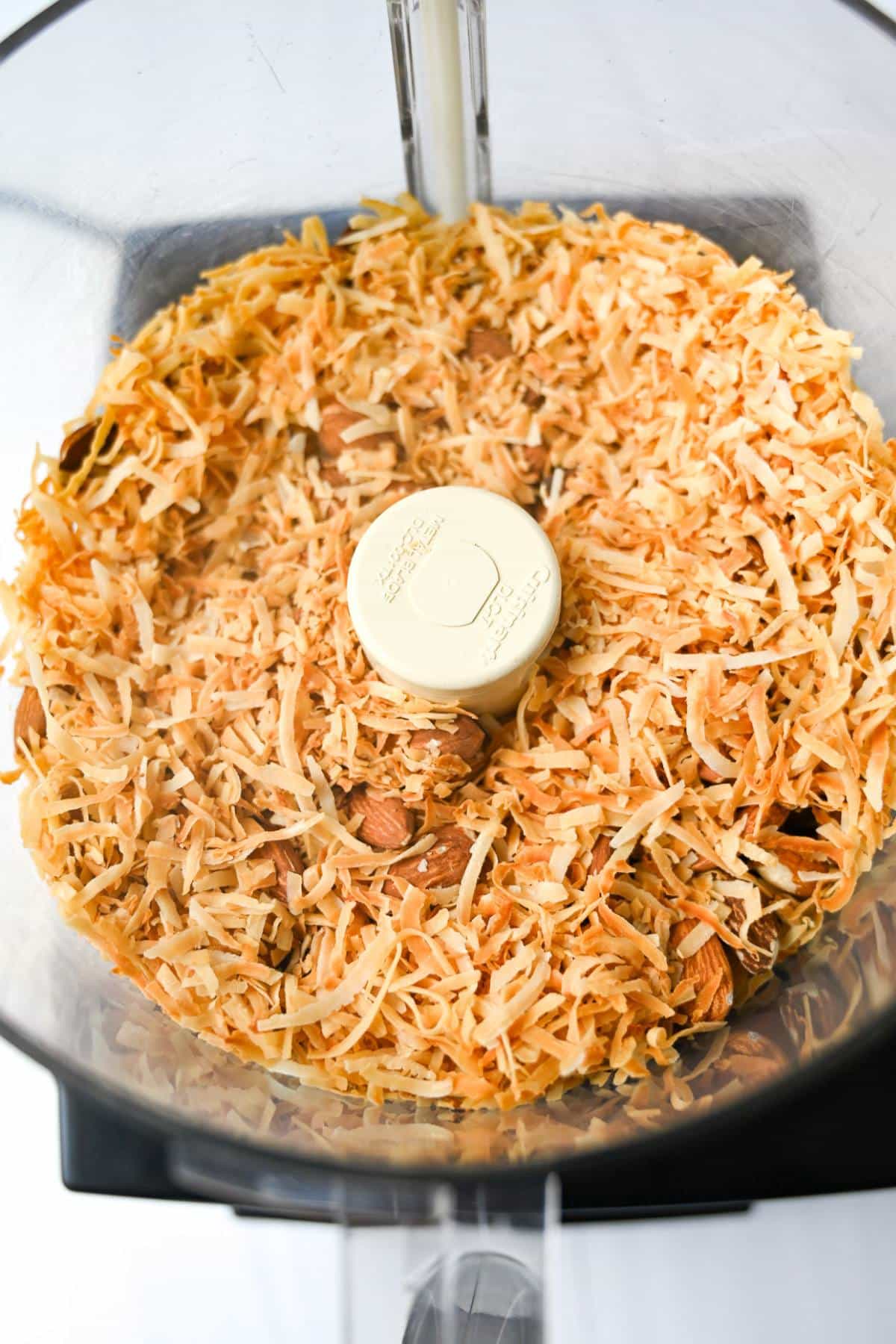 almonds and coconut in a food processor