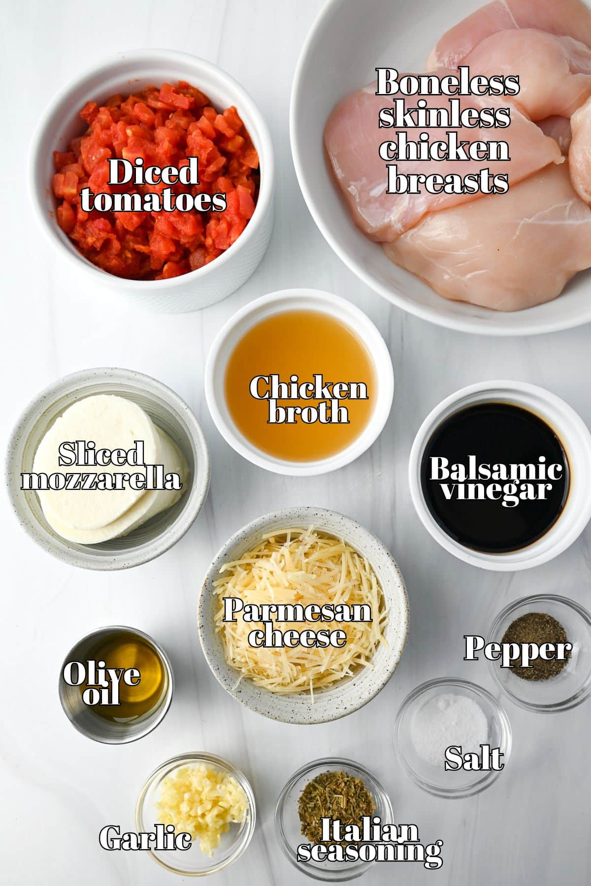 ingredients for slow cooker italian chicken measured out on a counter