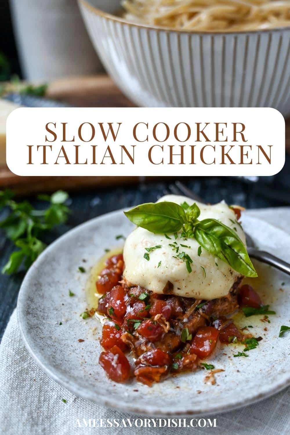 This Slow Cooker Italian Chicken is made with lean chicken breasts smothered in a simple chunky tomato sauce, garlic, herbs, and rich Italian cheeses. via @Ameessavorydish