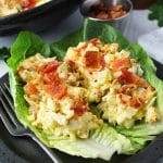 two romaine lettuce cups with egg salad and crispy bacon