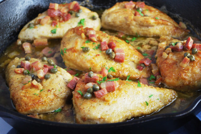 chicken piccata in a skillet ready to serve