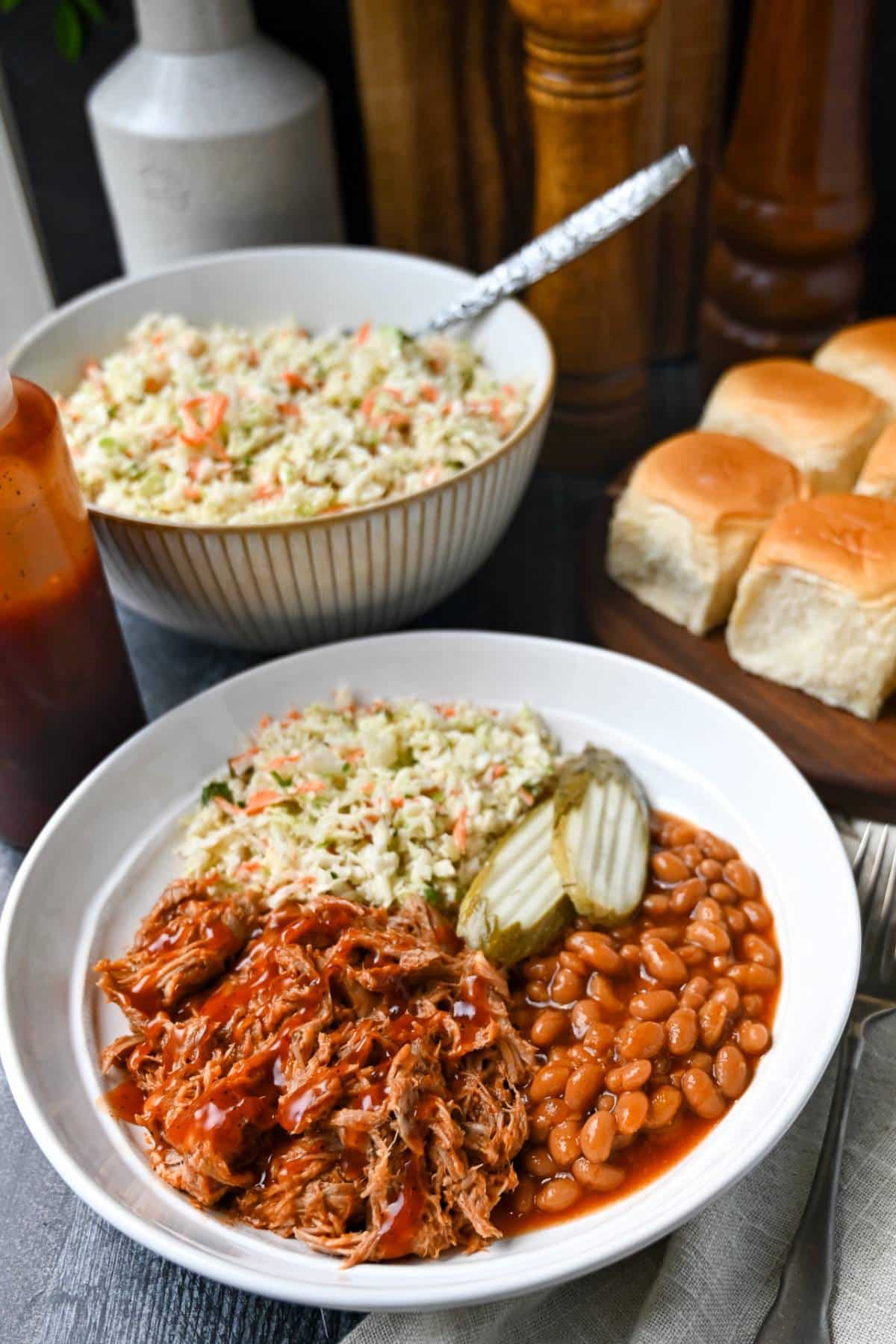 This Crockpot BBQ Pulled Pork recipe is incredibly easy, full of smoky, tangy flavor, and fall-apart tender. Perfect when you’re craving Southern-style pork BBQ on busy days! via @Ameessavorydish