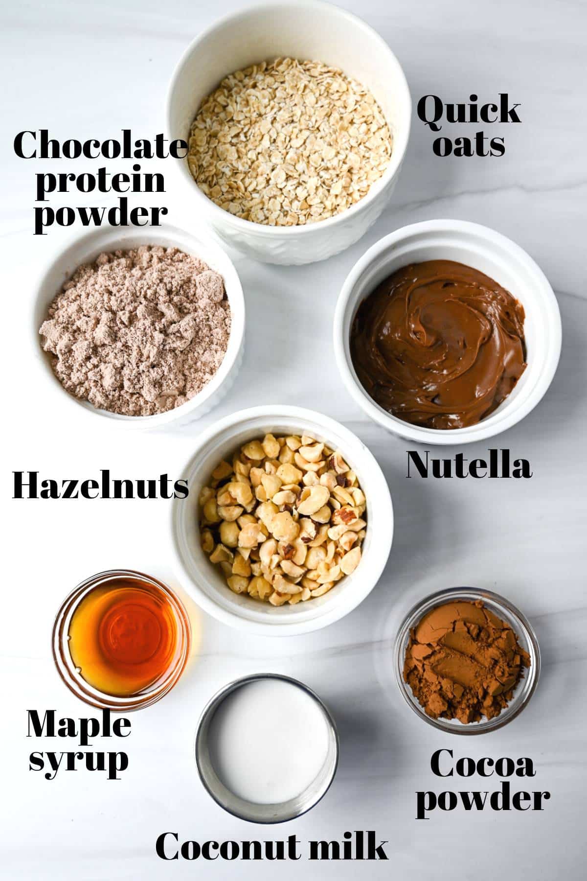 ingredients for nutella protein balls measured out in dishes on a counter