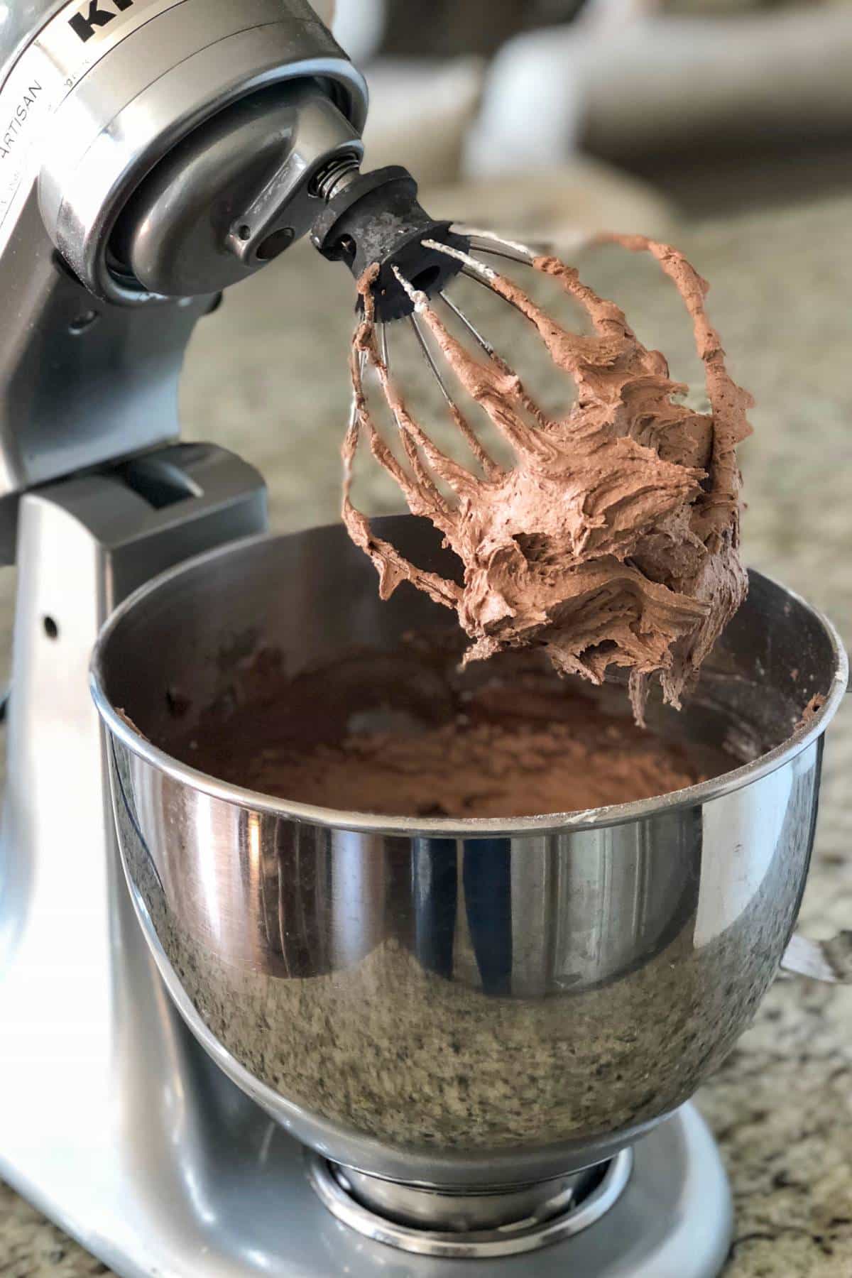 nutella frosting in a mixing bowl with a whisk attachment