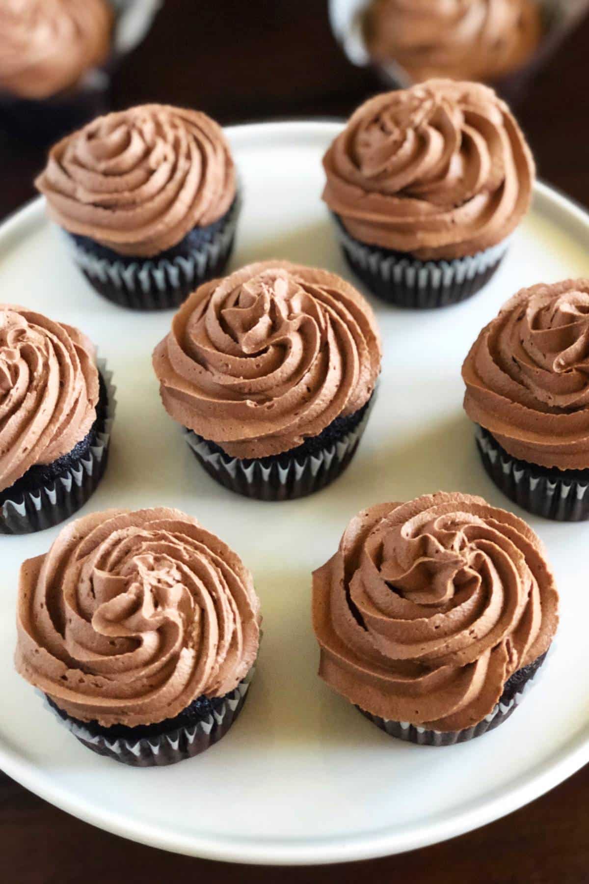 swirled frosting on top of chocolate cupcakes