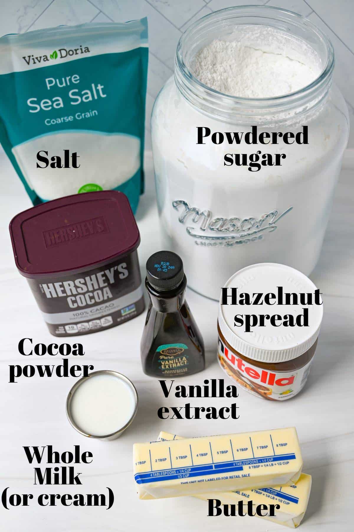 ingredients for nutella frosting displayed on a counter