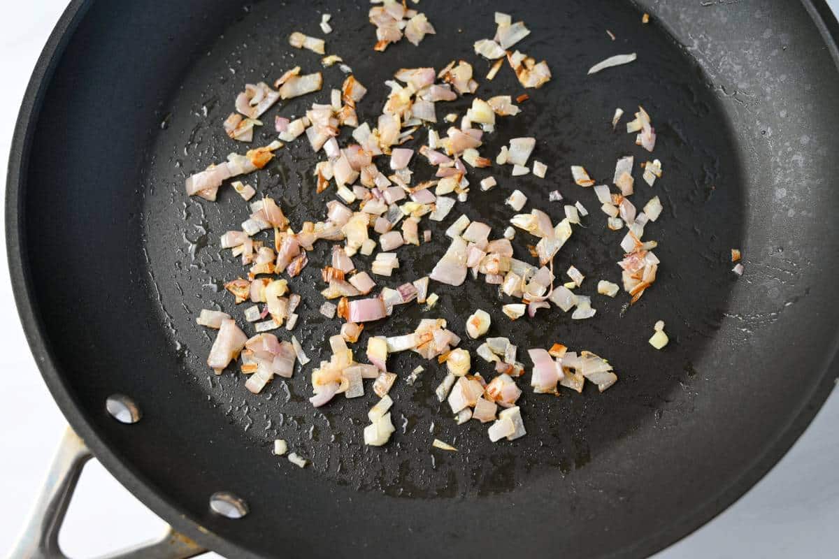 sauteed shallots in a skillet