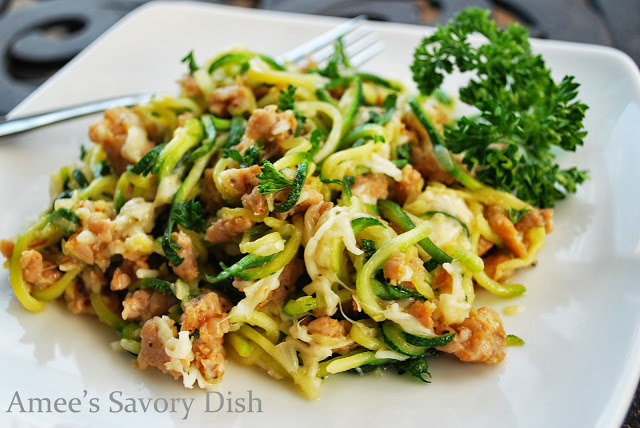 Zucchini pasta with sausage and Parmesan cheese