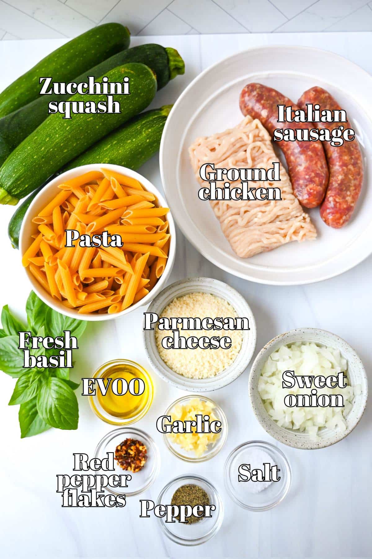 ingredients for zucchini pasta measured out on a counter