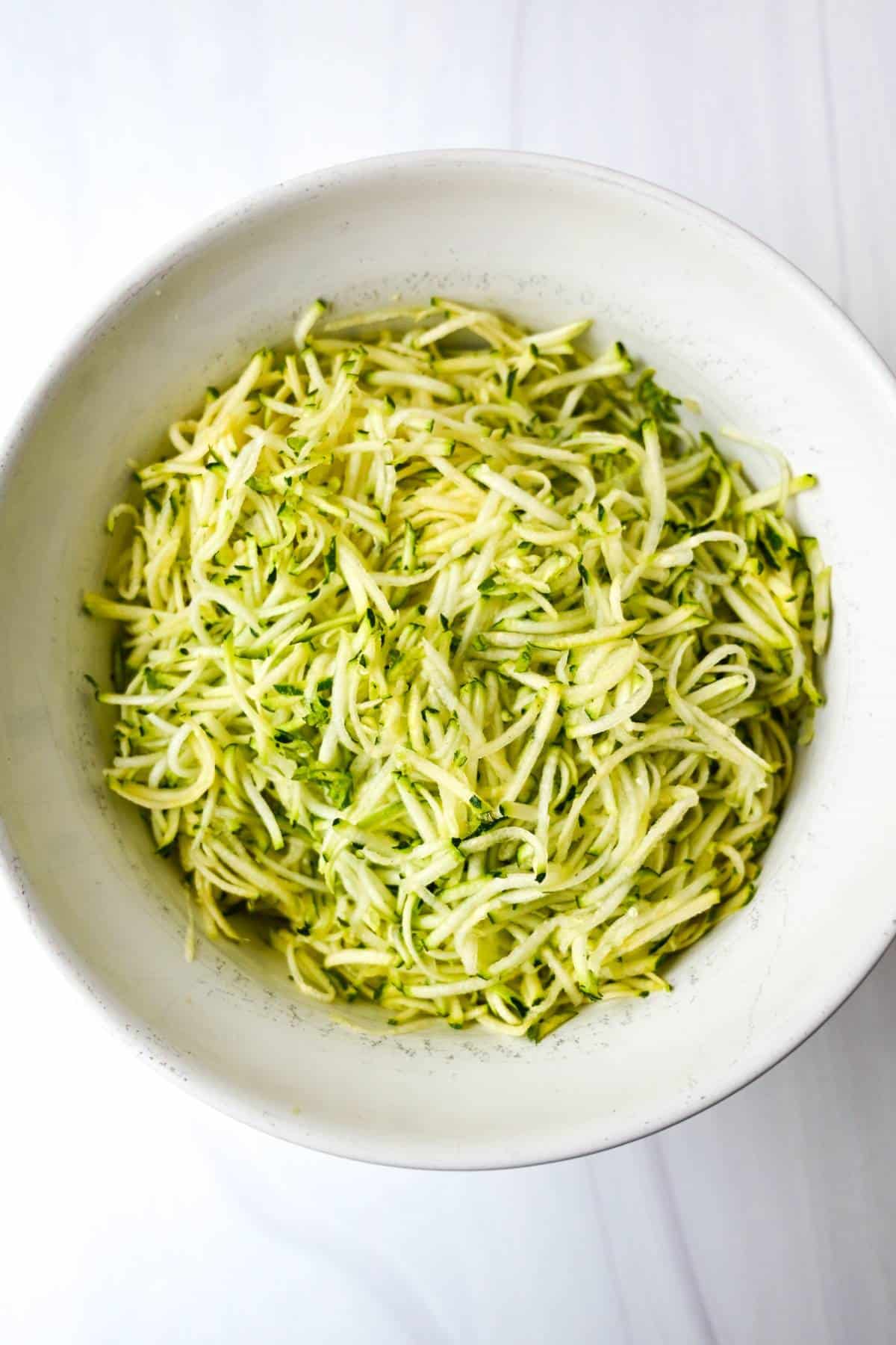 shredded zucchini in a bowl