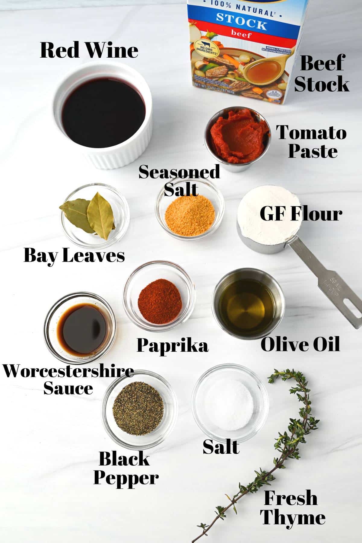 spices and seasonings for beef stew on a counter