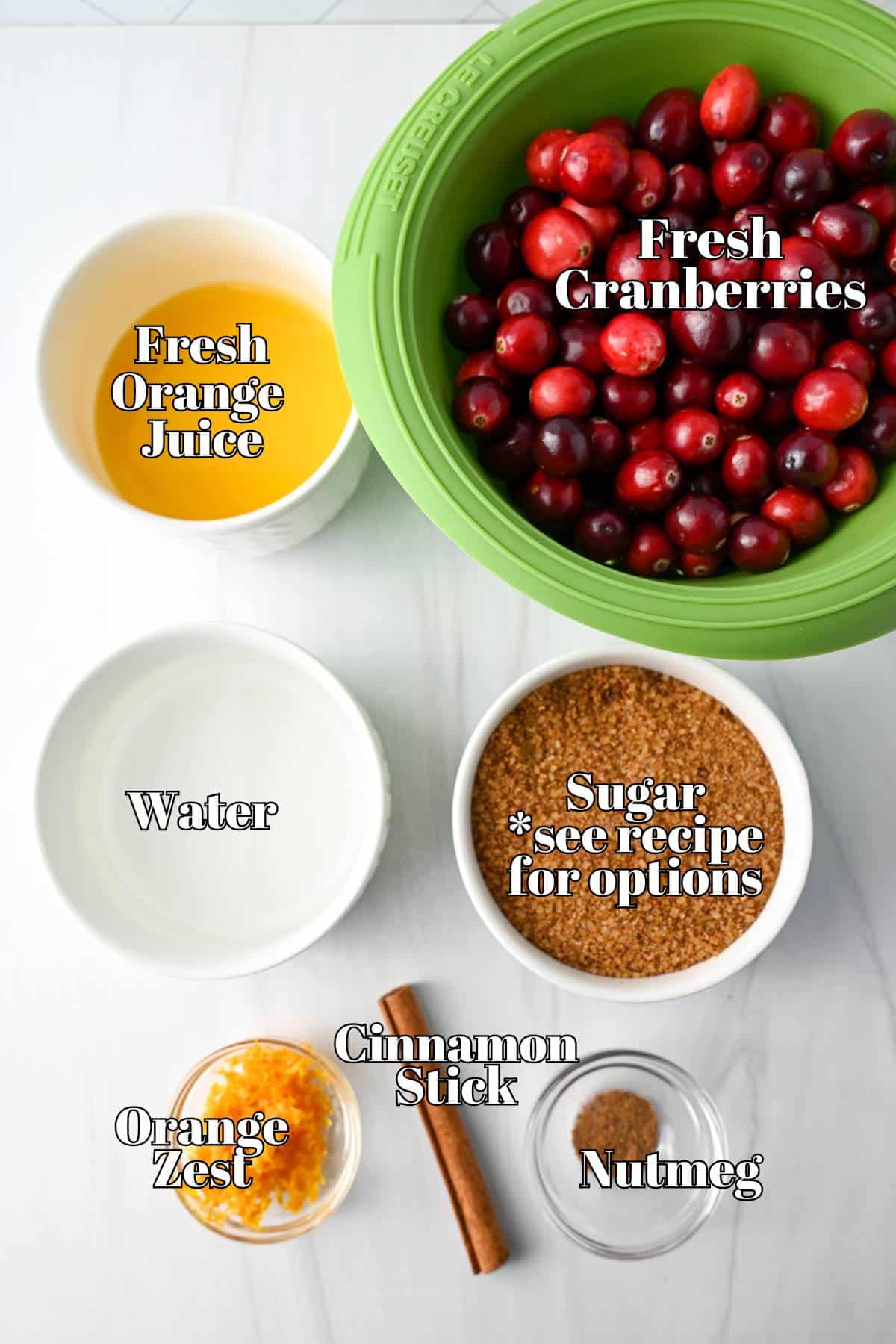 ingredients for whole berry cranberry sauce measured out on a counter