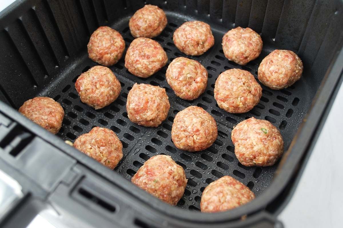 meatballs in an air fryer ready to cook