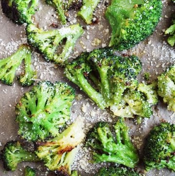 roasted broccoli on a roasting pan with cheese