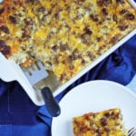 sausage and egg breakfast casserole in a dish and on a plate