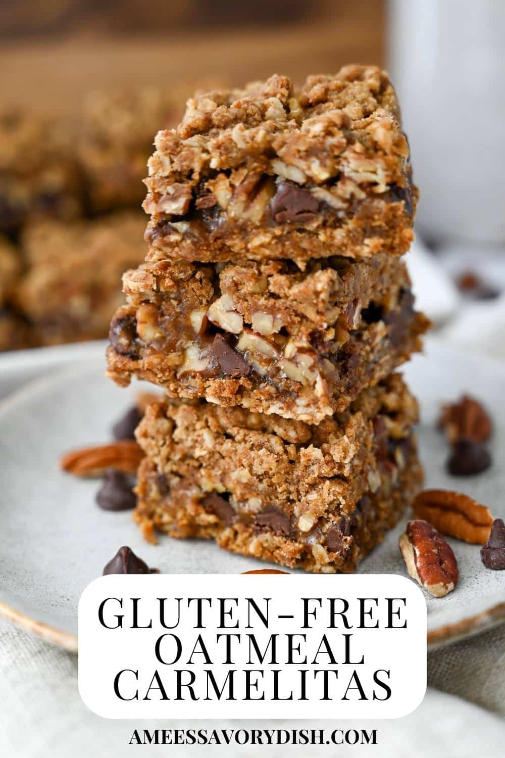 Gluten-free oatmeal Carmelita bars are chewy oatmeal bars with creamy caramel, chocolate, and crunchy pecans. This easy gluten-free bar cookies recipe makes the perfect after school snack or gluten-free dessert. #carmelitabars #carmelitas #glutenfreebarcookie #glutenfreedessert #glutenfreecarmelitas via @Ameessavorydish