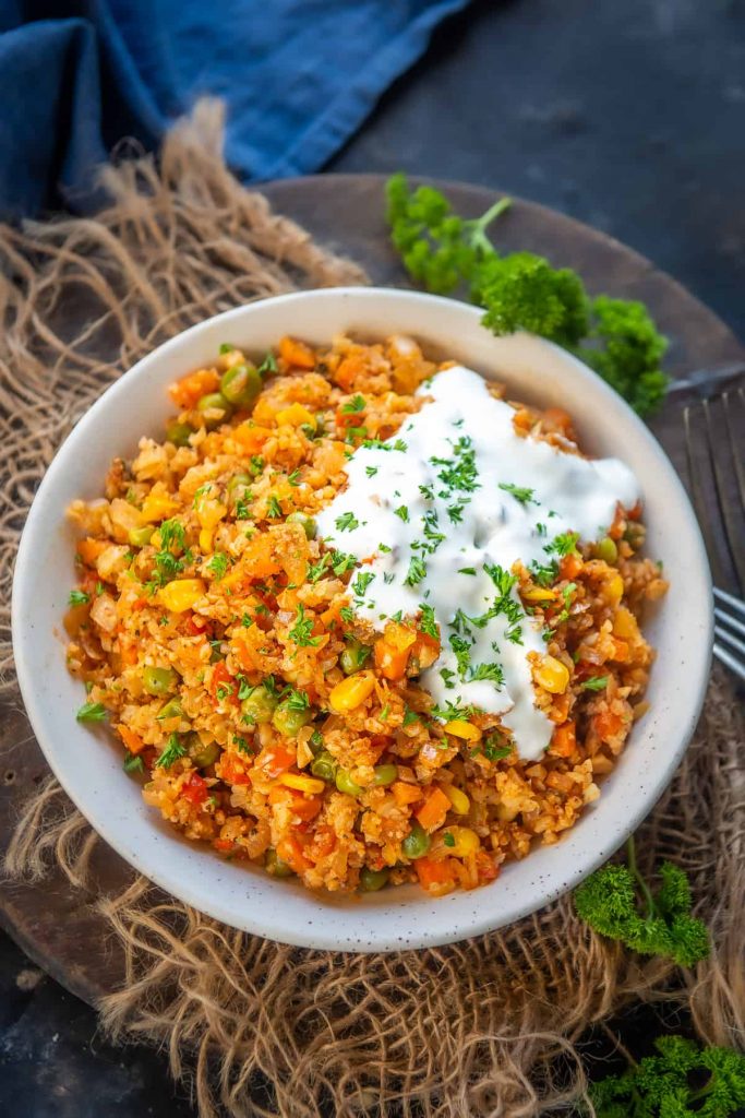 mexican low carb dish topped with sour cream
