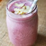 cherry almond smoothie in a mason jar