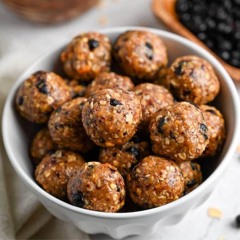 a bowl full of peanut butter and jelly energy balls