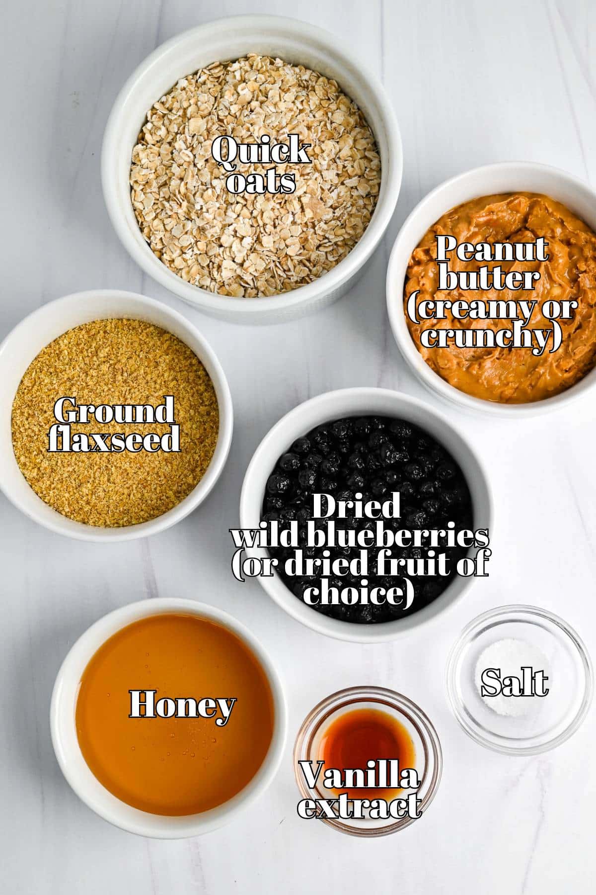 ingredients for pb&J bites measured on a counter