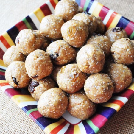 A quick and easy recipe for energy bites made with peanut butter, dried fruit and seeds for a nutrient dense snack on-the-go.