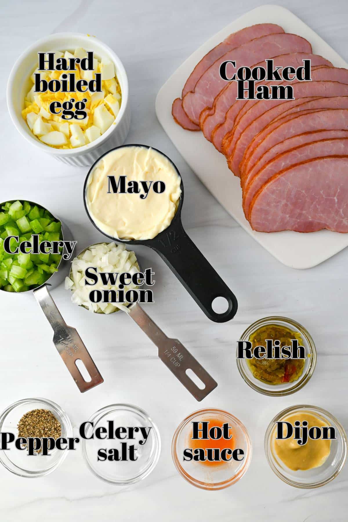 ingredients for making ham salad measured out on a counter