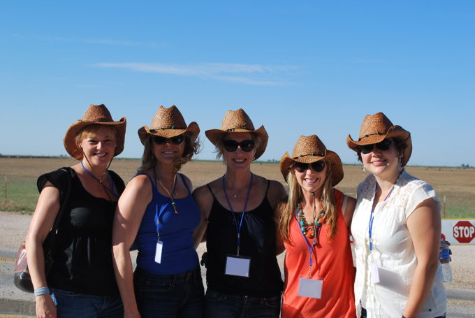 food bloggers pose for a picture on a beef cattle ranch