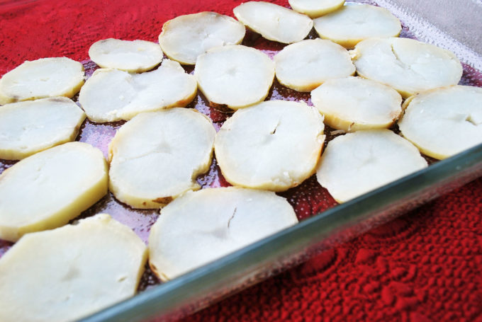 Sliced potatoes for the base of loaded potato breakfast casserole