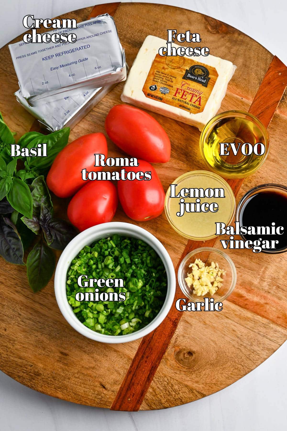 caprese dip ingredients on a cutting board