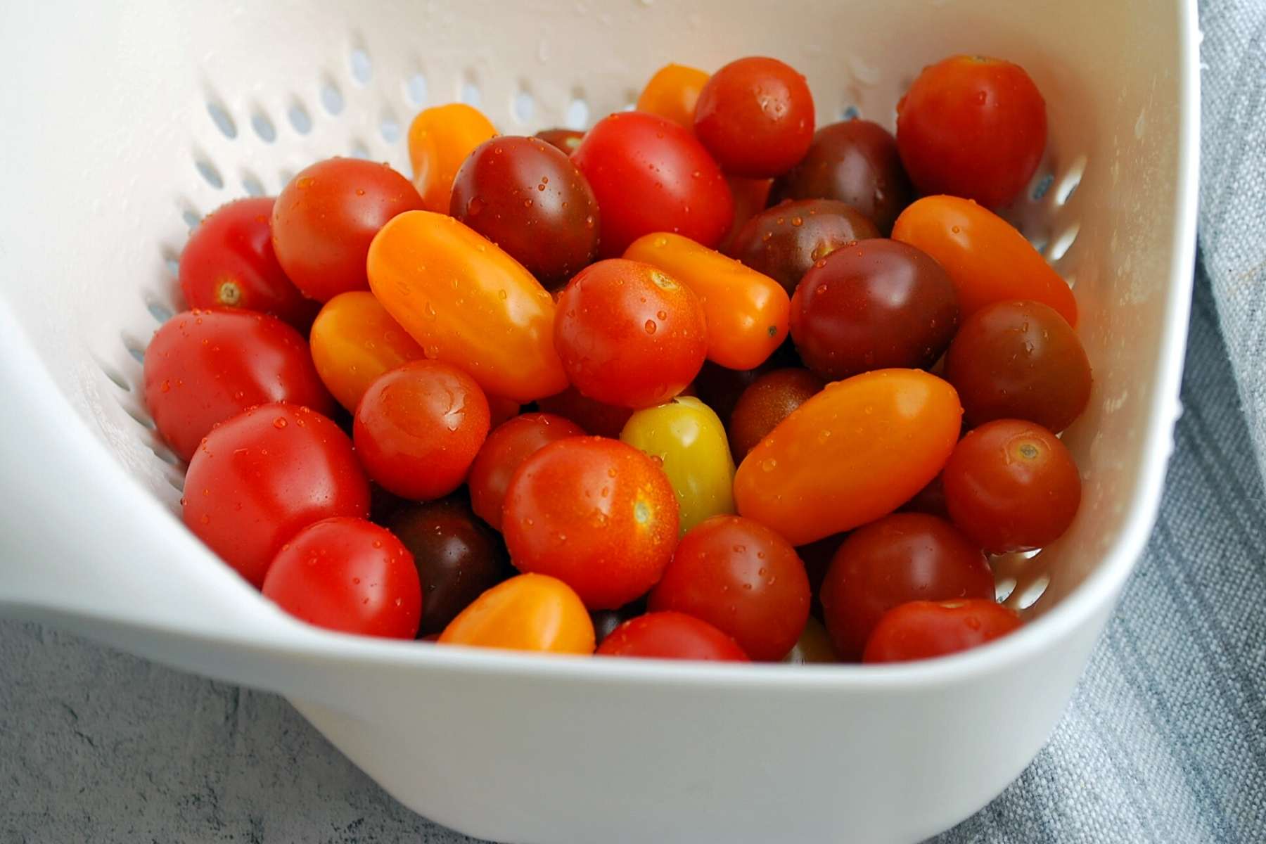 fresh cherry tomatoes in a bowl