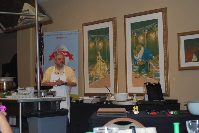 Chef doing a cooking demo at the Food and Wine conference