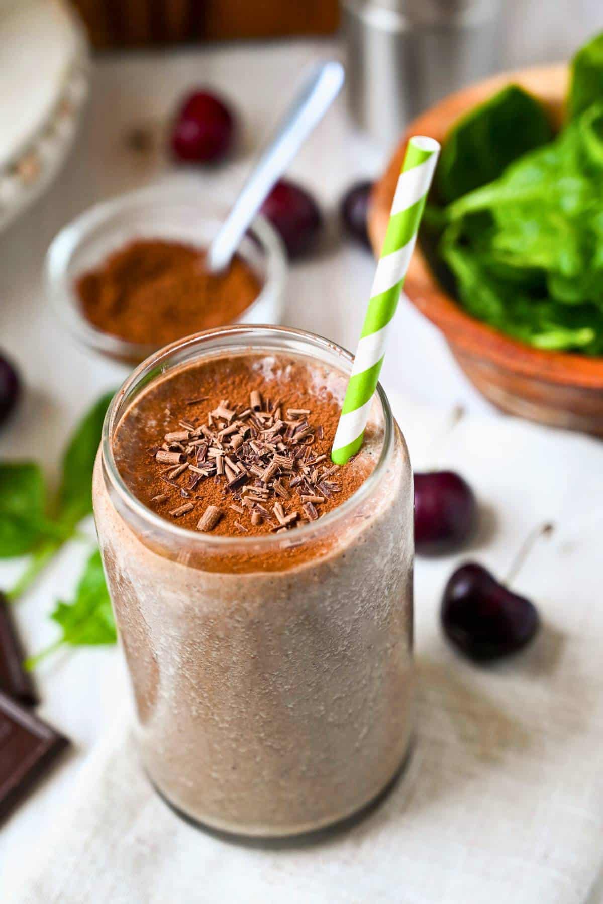 This Chocolate Cherry Smoothie is made with just a few nutritious ingredients, including frozen cherries, banana, whey protein, and hidden greens—packed with 30 grams of protein per serving! via @Ameessavorydish