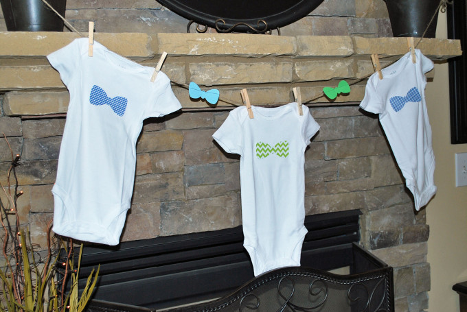 onesies mantel decor for a southern gentleman themed baby shower