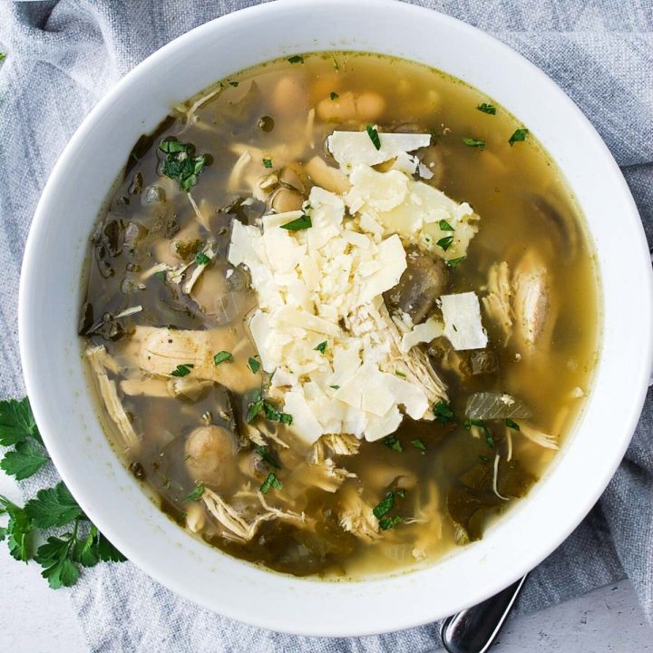 overhead photo of a bowl of chicken bean soup