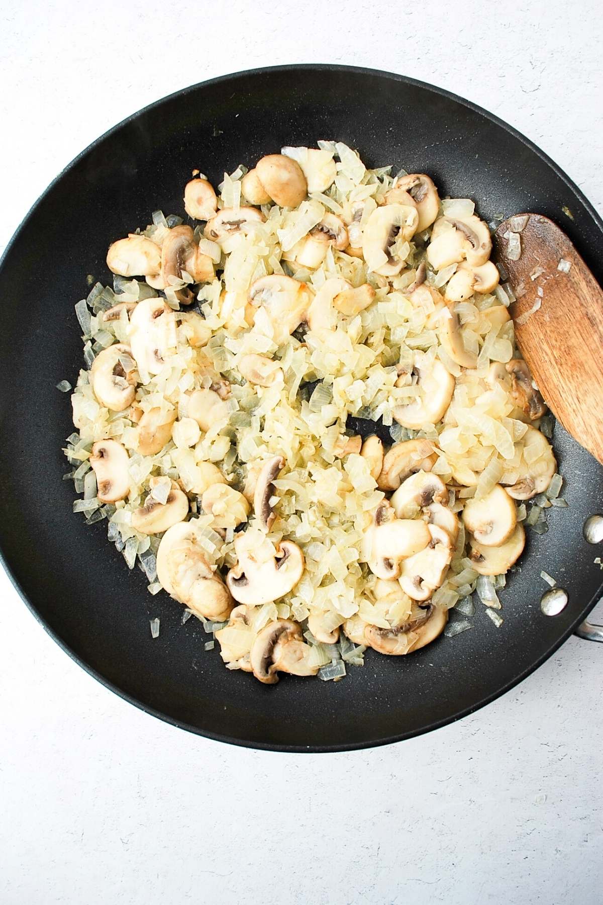 sauteed mushrooms, onion, and garlic in a skillet