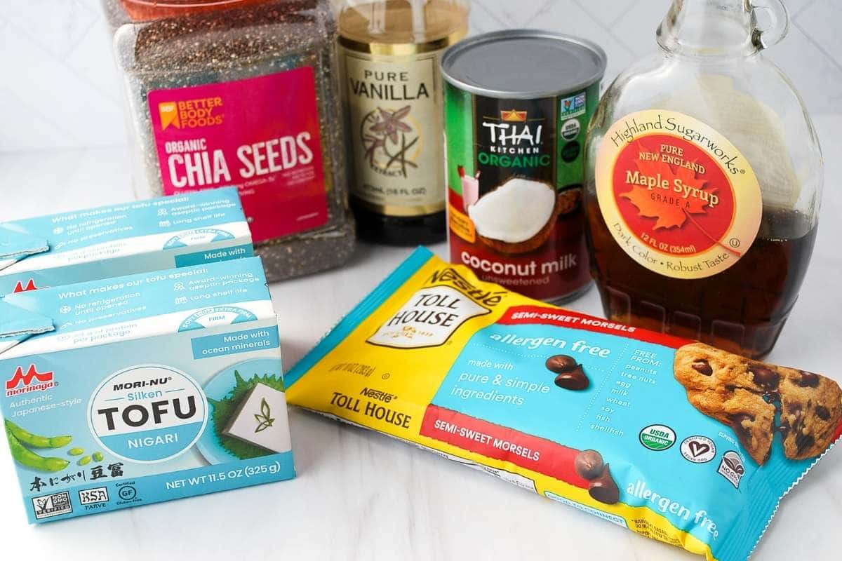 ingredients for chocolate protein chia pudding on a counter