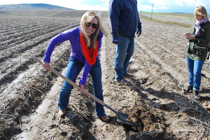 A couple of people that are standing in the dirt